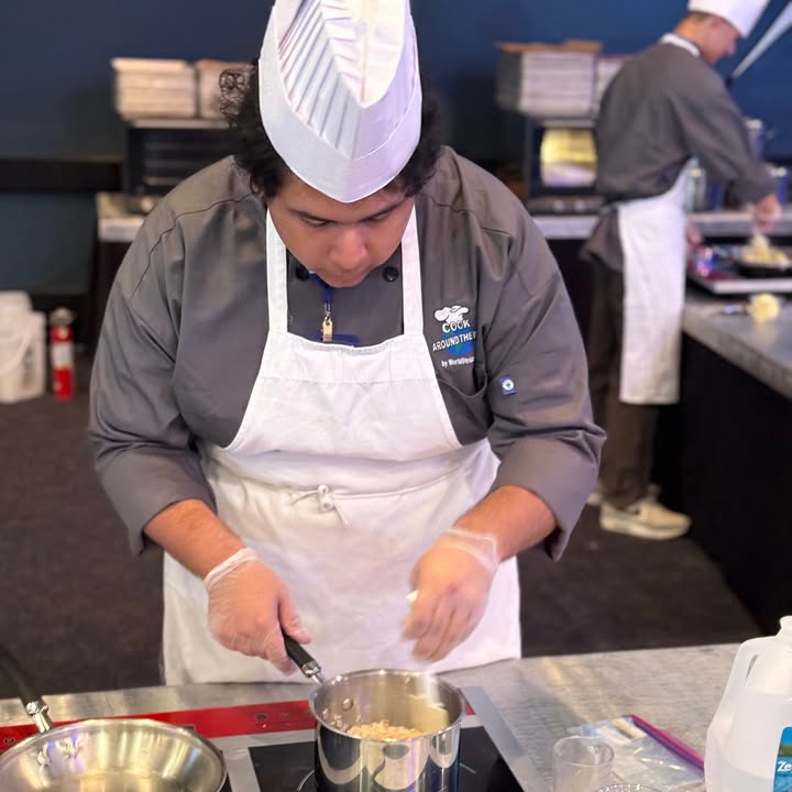 Rayburn’s Culinary Club at the Cook Around the World Competition, showcasing their skills and cooking Asian dishes in a race against time.
