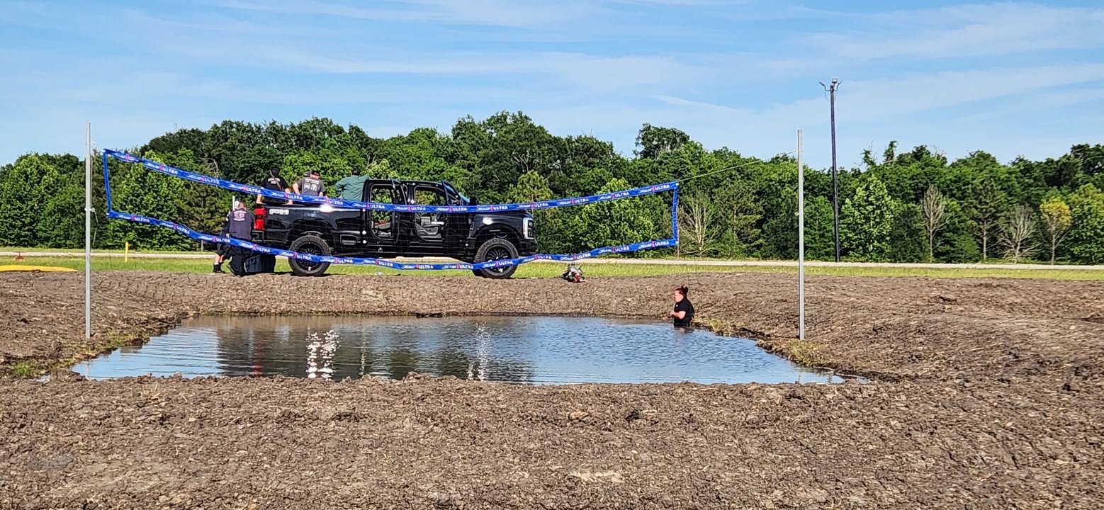 Digg deep and get dirty at the Strawberry Festival’s mud volleyball.