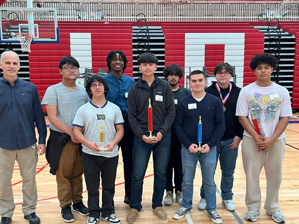The Dobie chess team clinched first place overall, led by Hussai Arias, with strong finishes from Ullman and Alvarez.