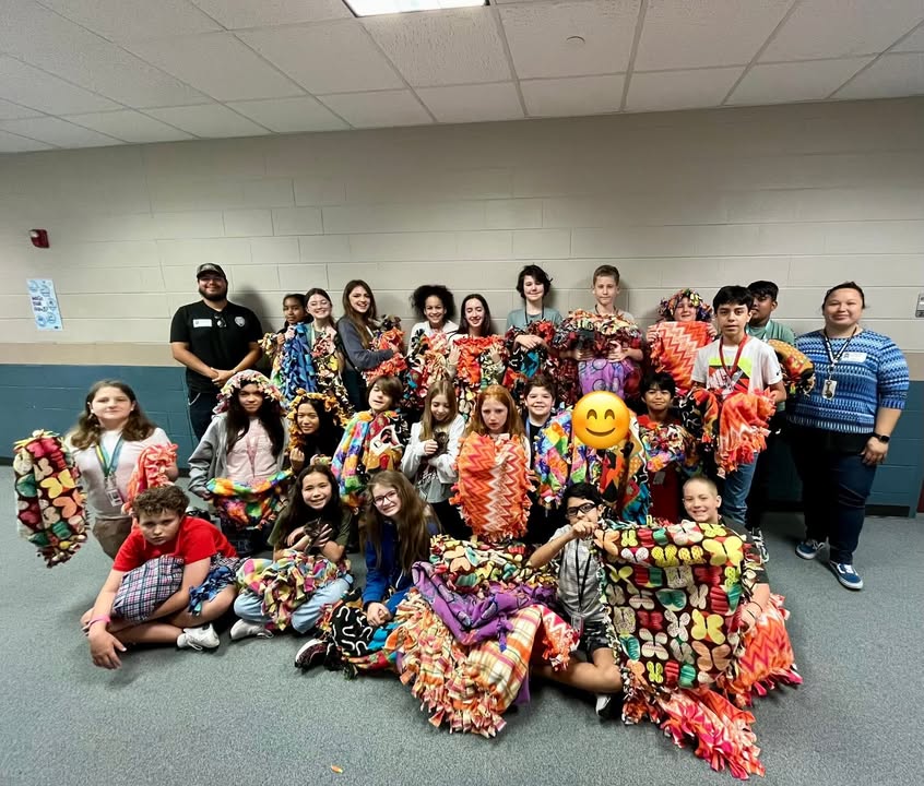 Ms. Camfield’s 6th grade Shelter Helpers have transformed donated fleece into adorable no-sew blankets for Animal Shelter inmates.