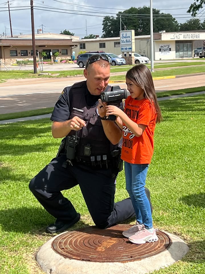 DPPD and kids on Center St. running a radar and finding out facts. DPPD and kids on Center St. running a radar and finding out facts.