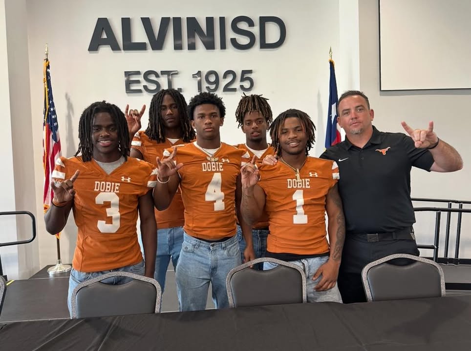 The Dobie Football team representing at the Alvin Lions Club Pigskin Preview showcasing talent and teamwork.