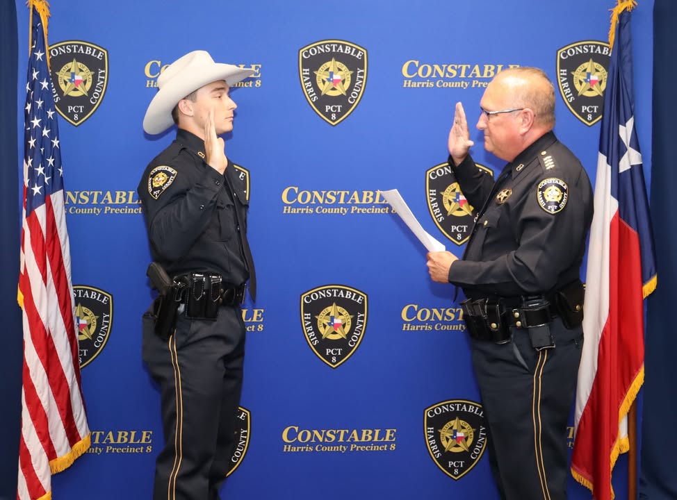 Constable Phil Sandlin proudly welcomed Deputy Christian Mclain into the Precinct 8 family during a Swearing-In Ceremony at the Clear Lake station. Constable Phil Sandlin proudly welcomed Deputy Christian Mclain into the Precinct 8 family during a Swearing-In Ceremony at the Clear Lake station.