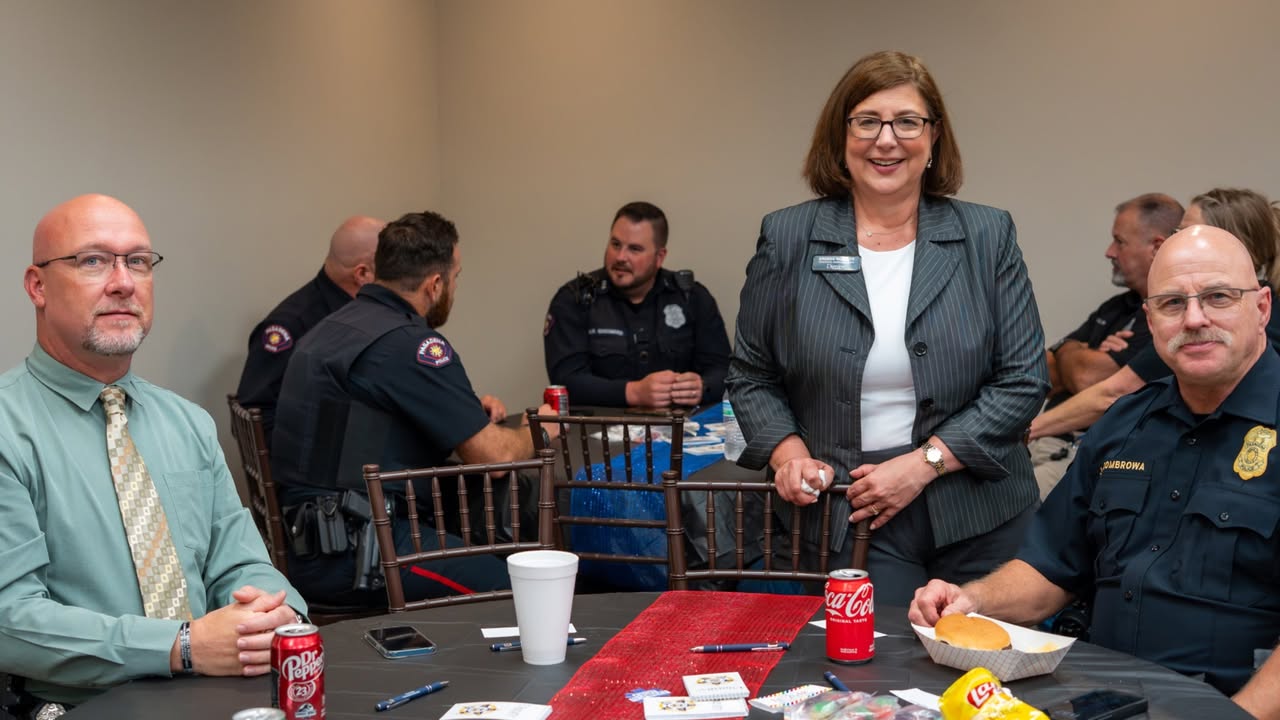 Nothing beats the taste of grilled burgers and hot dogs for PPD and friends at Grand View Funeral Home.