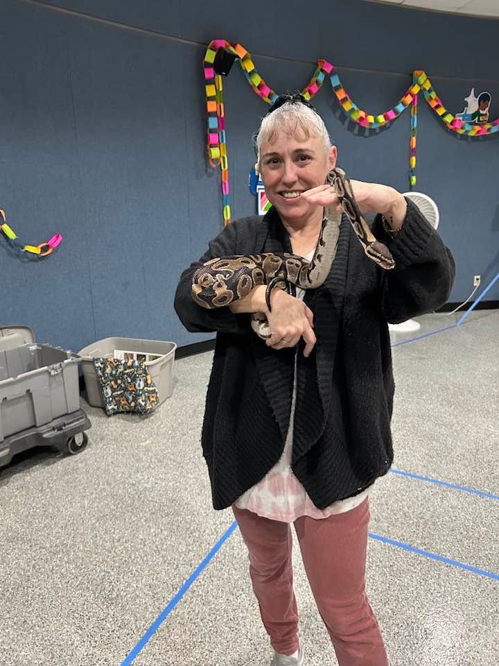 Central Library patrons wrangling with Texas Snakes & More and a wild day of unforgettable fun.