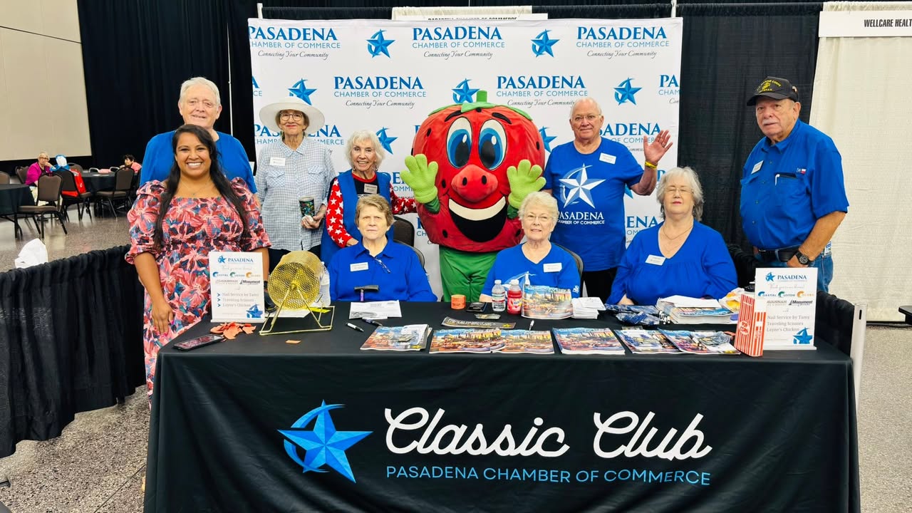 Buzz Berry partying at the Madison Jobe Senior Expo, embracing joy, camaraderie, and lots of fruity smiles from lovely people.