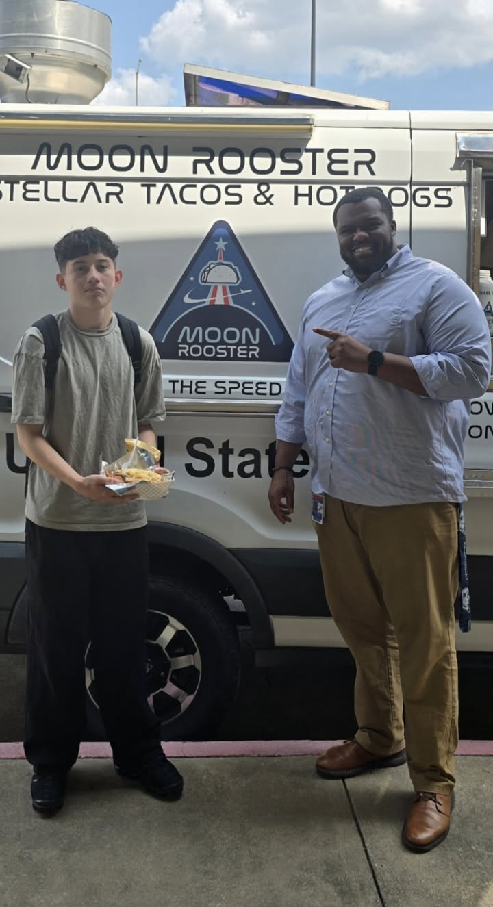 Pasadena High student Frank won food from Moon Rooster for perfect attendance. Pasadena High student Frank won food from Moon Rooster for perfect attendance.