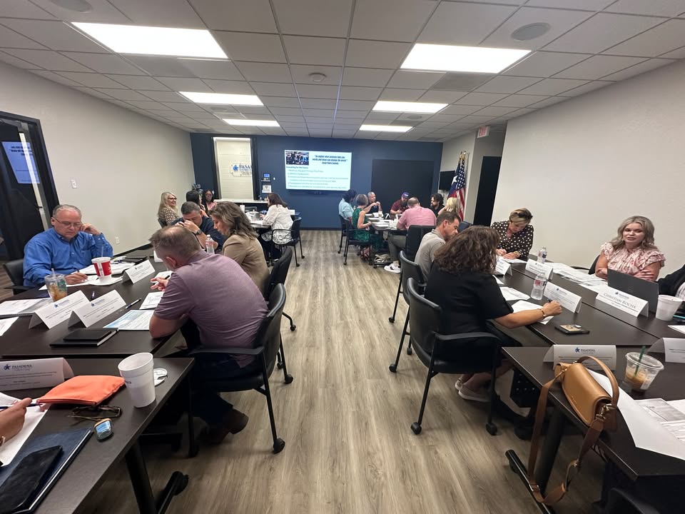 The Chamber’s Board of Directors meeting, brainstorming innovative ideas, showcasing their diverse industries and dynamic teamwork.
